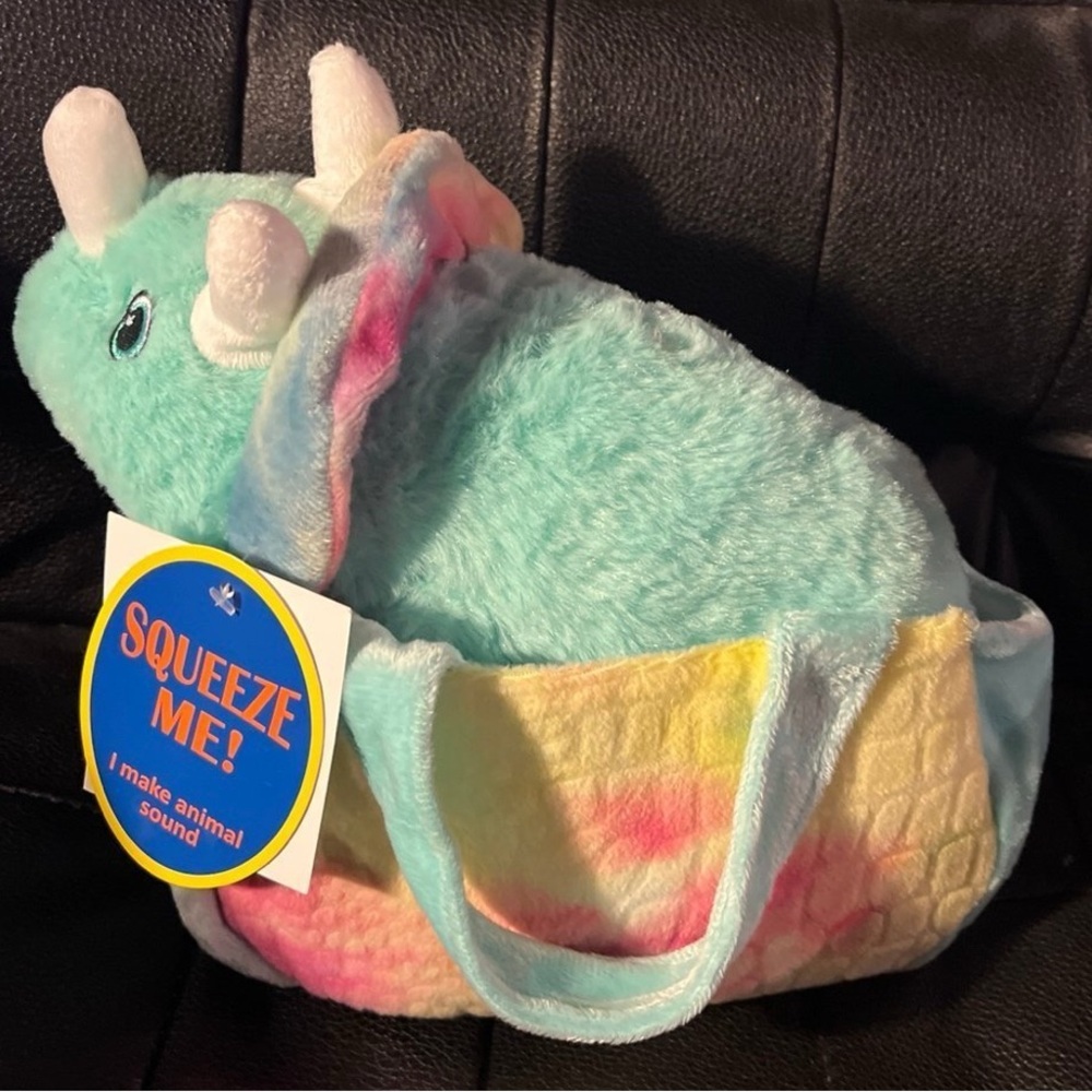 Dinosaur in a purse plush NWT.